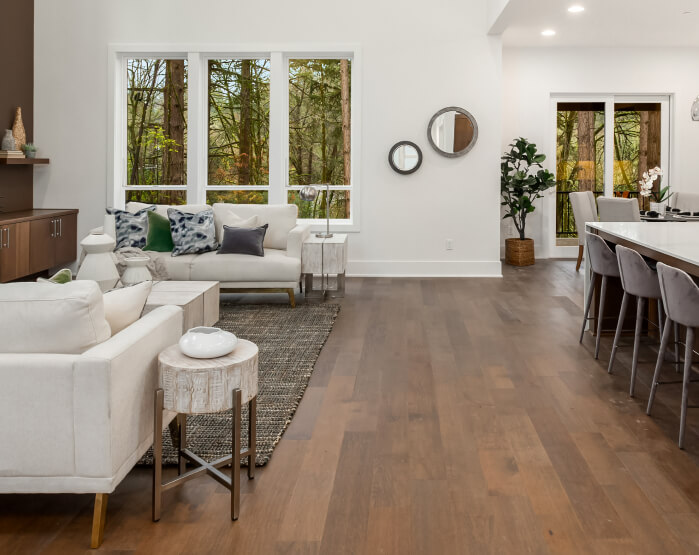 Open kitchen with wood look flooring